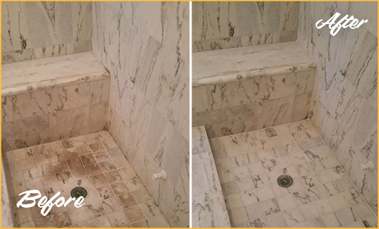 Before and After Picture of a Oxford Marble Shower Honed to Remove Dark Stains