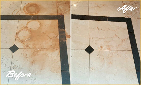 Before and After Picture of a Huntington Woods Hard Surface Restoration Service on a Marble Floor to Eliminate Rust Stains